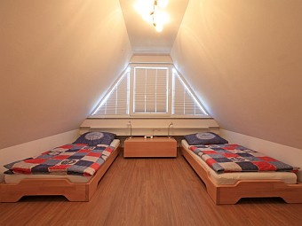 Ein Schlafzimmer im ausgebauten Spitzboden
